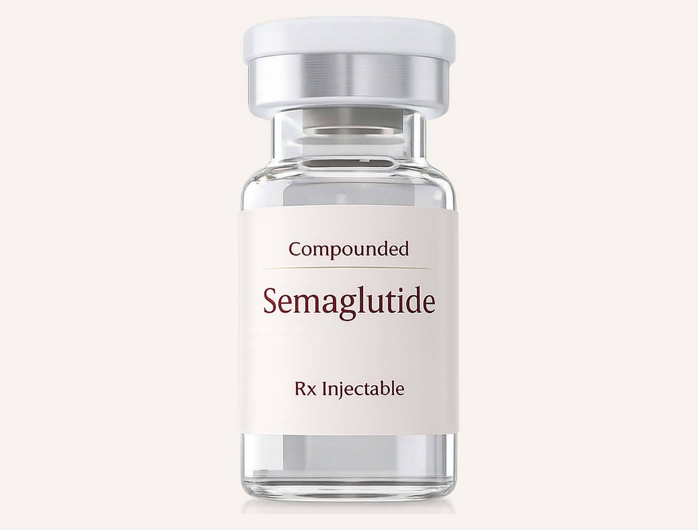 Compounded semaglutide vial with a HealFast cream and crimson label on a warm neutral background